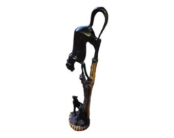 Hand-Carved Ebony Cheetah Sculpture: African Wildlife Art (20x6x8 inches)