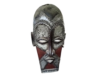 Embossed Metal Ngata Mask: Central African Ceremonial Wall Hanging