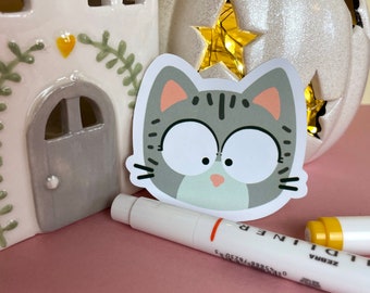 Grey Tabby cat face vinyl sticker - 6CM