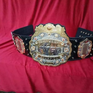 IWGP WORLD HEAVYWEIGHT wrestling championship title belt