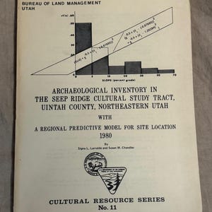 May include: A vintage booklet from the Bureau of Land Management, Utah, titled "Archaeological Inventory in the Seep Ridge Cultural Study Tract." The cover features a graph and text, including the year 1980 and the Cultural Resource Series No. 11.