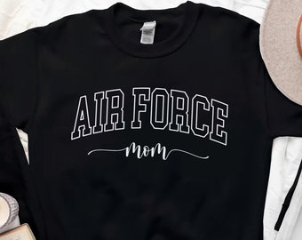 May include: Black sweatshirt with white text that reads "Air Force Mom" in a collegiate font.