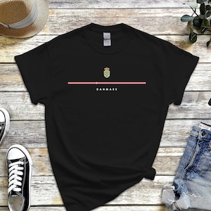 May include: Black t-shirt with a red line and the word "DANMARK" in white text. The Danish coat of arms is above the text.