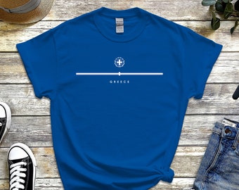 May include: A royal blue t-shirt with a white graphic of a circle with a cross inside and the word "GREECE" underneath.