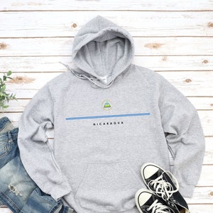 Sweat à capuche Nicaragua, logo du pays avec sweat-shirt drapeau, armoiries du Nicaragua, pull Nicaragua Cool Comfort