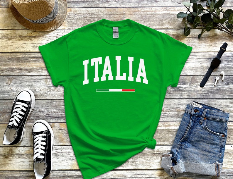 May include: Green t-shirt with white text that says "ITALIA" and a small Italian flag graphic.