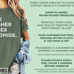 May include: An olive green t-shirt with the text "THE HIGHER VIBES PROMISE" in white. The shirt is part of the "HIGHER VIBES SHOPPE" collection. The image also includes text about the brand's values and policies.