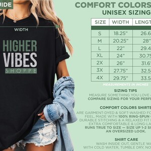 May include: Black t-shirt with the text "HIGHER VIBES SHOPPE" in white and green. The image includes a size guide with measurements in inches for Comfort Colors unisex shirts. The shirt is garment-dyed and made with ring-spun cotton.