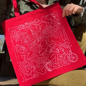 Pink on Red Trans Liberation is Community Care Tote / Trans Healthcare / Queer Liberation Bag / Transgender Mutual Aid / Pride