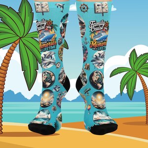May include: A pair of light blue socks with a cruise theme. The socks feature images of dolphins, globes, and a cruise ship, with the text "Family Cruise 2020" and "Making Memories for a Lifetime". The socks have black heels and toes.