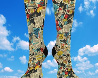 May include: A pair of black and white socks with a colorful comic book pattern. The socks feature a variety of characters and scenes from a comic book.