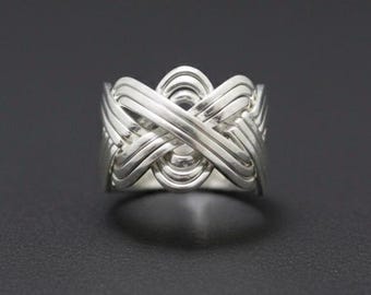Sterling Silver 12-Band Puzzle Ring: Handcrafted Unisex Jewelry