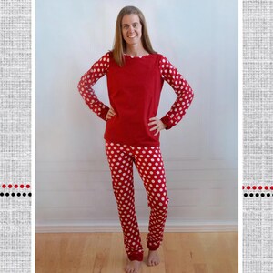 May include: Red knit pajamas with white polka dots. The long-sleeved top has a solid red body and polka dot sleeves. The matching pants are covered in white polka dots. The image includes the text "Polka Dot Umbrella" and "Tansy's Knit Pajamas."