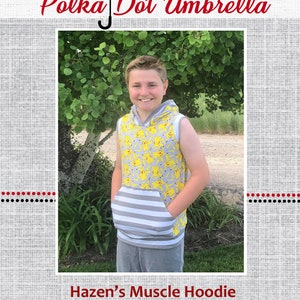 May include: A sleeveless hoodie with a yellow and grey Pikachu print on the front and a grey and white striped pocket. The hoodie has a hood and a drawstring. The model is wearing grey pants.