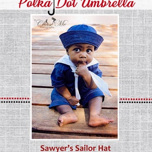 May include: A baby boy wearing a blue sailor hat and a blue and white sailor outfit is sitting on a wooden deck. The text "Sawyer's Sailor Hat" is below the image.
