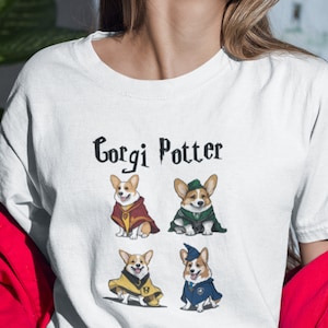 May include: White t-shirt with the text "Corgi Potter" in black. Four illustrations of corgis dressed as characters from the Harry Potter series.