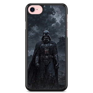 Peut inclure: Darth Vader, un personnage de Star Wars, se tient dans un décor sombre et orageux. Il porte son costume noir emblématique et son casque. L'arrière-plan est un ciel sombre et nuageux avec un soupçon de ville au loin.