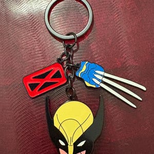 A Deadpool and Wolverine Black Keychain