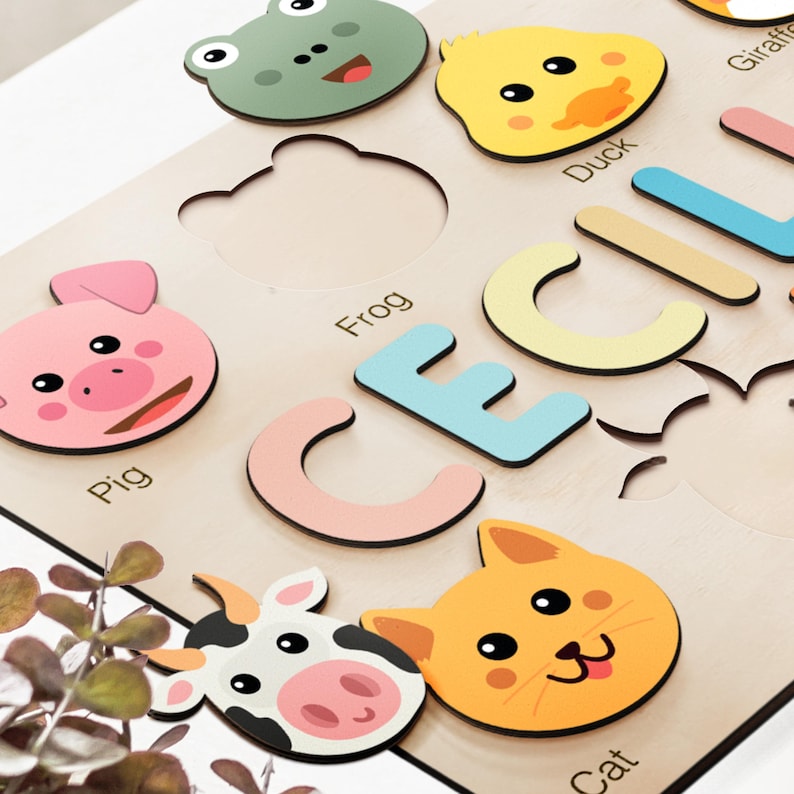 a close up of a cutting board with cut out animals
