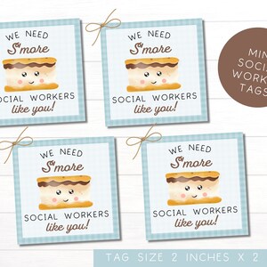 May include: Four blue and white patterned gift tags with a smiling s'more graphic and the text "We need s'more social workers like you!"  A brown tag with the text "Mini Social Worker Tags" is in the upper right corner. The tags are 2 inches by 2 inches.