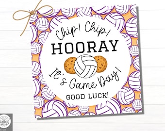 May include: A white and purple volleyball themed gift tag with the text "Chip! Chip! HOORAY It's Game Day! GOOD LUCK!" and a volleyball and two cookies.