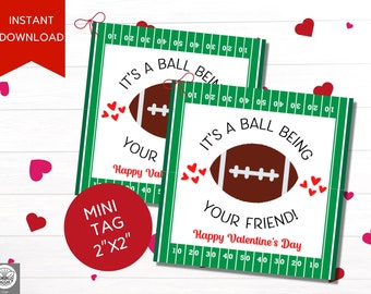 May include: Two printable Valentine's Day gift tags featuring a football with the text "It's a ball being your..." and "Happy Valentine's Day". The tags are 5 cm by 5 cm.