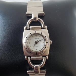 DIVINAL Japan movt vintage stainless steel quartz watch.