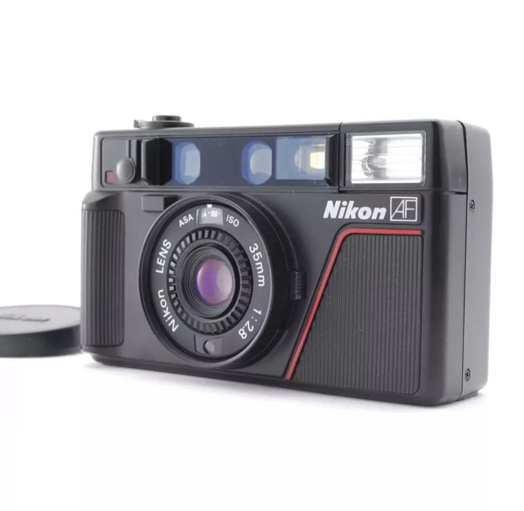 Appareil Photo Argentique Nikon L35 AF (35mm F/2.8, Autofocus) – état Nickel