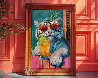 May include: A framed painting of a white tiger wearing sunglasses and holding a glass of orange juice with a lime wedge. The tiger is sitting on a pink and blue background with green foliage.