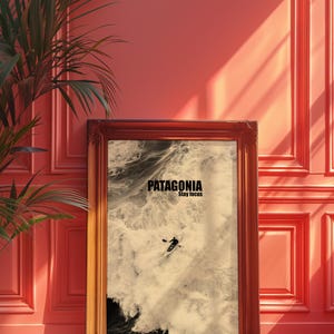 A paddler navigating rough ocean waves in a retro sepia tone. The phrase Patagonia Stay Focus highlights concentration and adventure. Perfect for water sports lovers and those seeking wilderness-inspired decor.