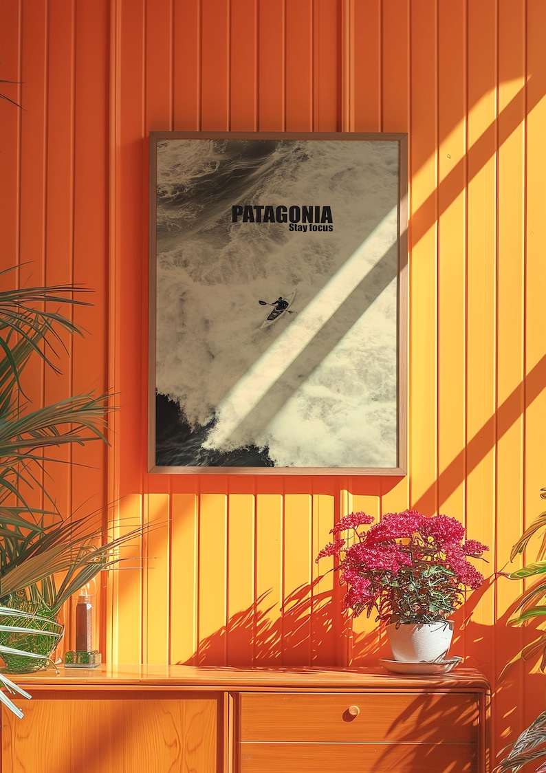 A thrilling poster featuring a paddler navigating intense whitewater rapids with the text Patagonia Stay Focus. This bold and adventurous design is perfect for extreme sports lovers and outdoor enthusiasts looking for dynamic wall decor.