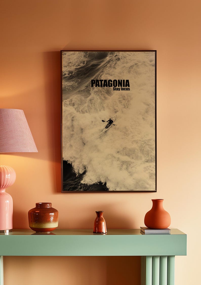 A thrilling poster featuring a paddler navigating intense whitewater rapids with the text Patagonia Stay Focus. This bold and adventurous design is perfect for extreme sports lovers and outdoor enthusiasts looking for dynamic wall decor.