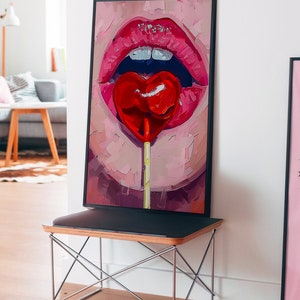 A heart-shaped lollipop is stuck in the mouth of an open female lips, in the style of pop art, pink and red, a digital painting, closeup, front view, with brush strokes, soft lighting, creating a romantic atmosphere