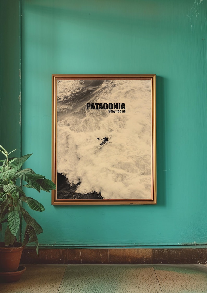 A thrilling poster featuring a paddler navigating intense whitewater rapids with the text Patagonia Stay Focus. This bold and adventurous design is perfect for extreme sports lovers and outdoor enthusiasts looking for dynamic wall decor.