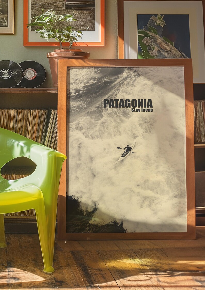 A thrilling poster featuring a paddler navigating intense whitewater rapids with the text Patagonia Stay Focus. This bold and adventurous design is perfect for extreme sports lovers and outdoor enthusiasts looking for dynamic wall decor.