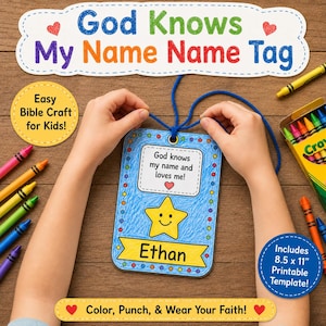 May include: A rectangular name tag craft featuring a blue background, a yellow star, and the name Ethan. The tag includes the text God knows my name and loves me! and is attached to a blue string. Surrounding the tag are colorful crayons.
