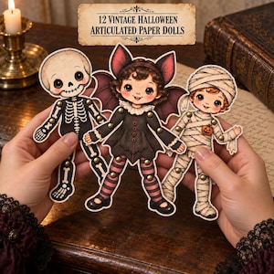 Könnte beinhalten: Drei bewegliche Papierpuppen mit Halloween-Motiven: ein Skelett, eine Figur mit Fledermausflügeln in schwarzer Kleidung und eine Mumie. Jede Figur hat sichtbare Metallnieten an den Gelenken. Der Text 12 VINTAGE HALLOWEEN ARTICULATED PAPER DOLLS ist zu sehen.