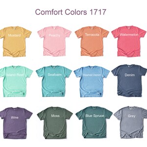 May include: A chart of 24 different colors of t-shirts, labeled with names like "Ivory", "Banana", "Mustard", "Peachy", "Terracotta", "Watermelon", "Yam", "Espresso", "Ocean", "Chalky Mint", "Island Reef", "Seafoam", "Washed Denim", "Denim", "Crimson", "Orchid", "Berry", "Wine", "Moss", "Blue Spruce", "Grey", "Bay", and "Pepper".