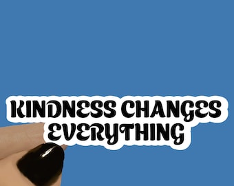 May include: Black and white sticker with the text "KINDNESS CHANGES EVERYTHING" in a retro font. The sticker is available in 3, 4, or 5 inch lengths.