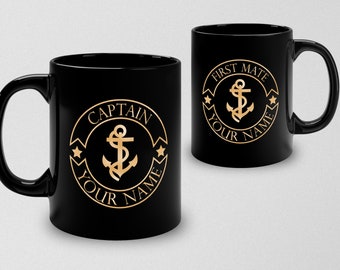 May include: Two black ceramic mugs with gold anchor and text designs. The mug on the left says "Captain Your Name" and the mug on the right says "First Mate Your Name".