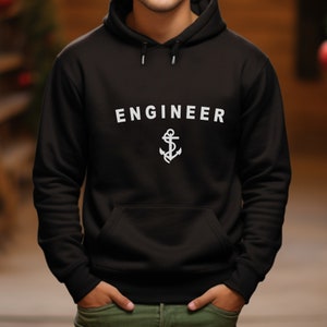 May include: Black hooded sweatshirt with the text "ENGINEER" and an anchor graphic in white.