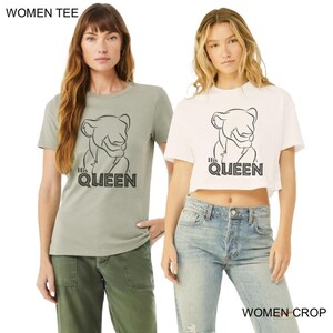 May include: Two t-shirts, one sage green and one white, each featuring a black lion graphic and the text "His QUEEN." The shirts are short-sleeved, with the white one cropped. The image is labeled "WOMEN TEE" and "WOMEN CROP."