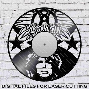 Könnte beinhalten: Schwarzweißes Laser-Schnittdesign des Aerosmith-Logos mit einem Stern und einem Porträt von Steven Tyler. Das Design ist für die Verwendung auf einer Schallplatte gedacht.