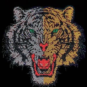 May include: A tiger head patch composed of small, reflective rhinestones. The left side is white and silver, while the right side is gold and orange. The tiger has bright green eyes, a red nose, and an open mouth showing red teeth and gums.