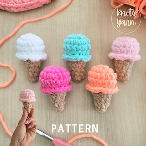 May include: A collection of handmade crochet ice cream cones in various pastel colors, including white, teal, pink, and orange. The cones are brown. The word "PATTERN" is printed in white at the bottom of the image.