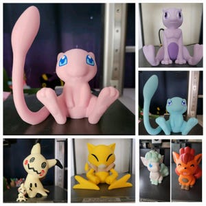 May include: A collection of 3D printed Pokemon figures, including a pink Mewtwo, a blue Eevee, a yellow Pikachu, a white and blue Clefairy, a red and orange Vulpix, and a brown and white Gastly.