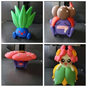 May include: Four different Pokemon figures, each with a unique design and color scheme. The figures are made of plastic and are approximately 3 inches tall. The figures are all in a standing position and are facing the camera.