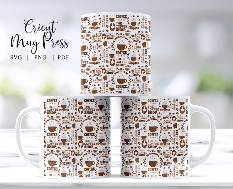 May include: Three white ceramic mugs with brown text and graphics. The mugs are stacked on top of each other. The text on the mugs reads "Coffee, The Coffee Shop, Espresso, Premium, Cafe".