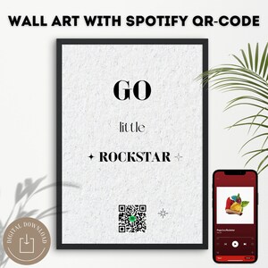 May include: Black and white wall art print with the text "GO little ROCKSTAR" and a Spotify QR code. The print is framed in a black frame.