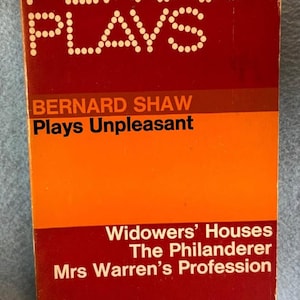 May include: A vintage paperback book titled "PENGUIN PLAYS" by Bernard Shaw. The cover features a bold design with the title in white dot lettering on a dark red background. The book's title is "Plays Unpleasant". The book also lists "Widowers' Houses", "The Philanderer", and "Mrs Warren's Profession".